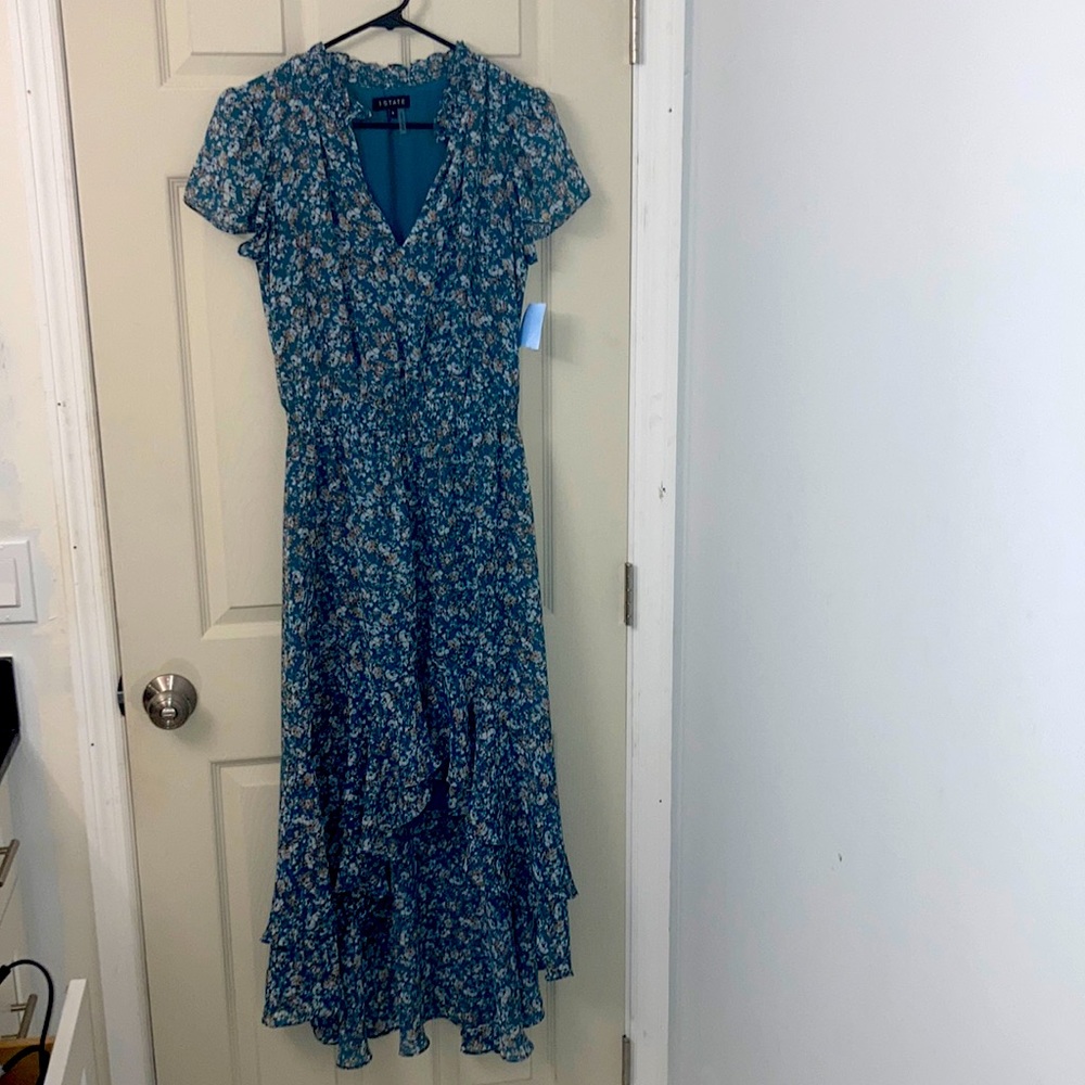Flower print green dress.